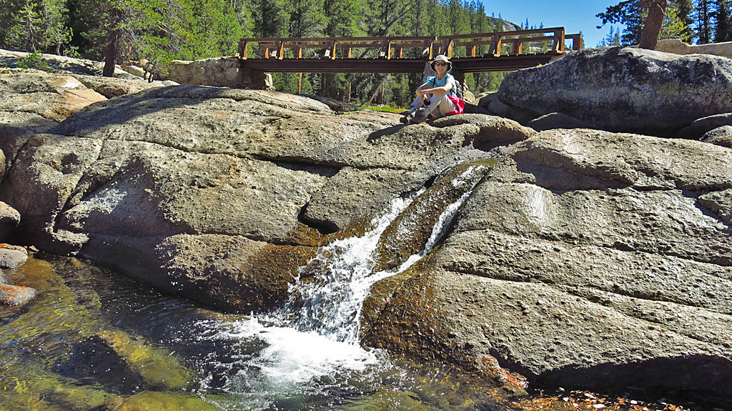 Taking a break at the first river crossing, 4.2 miles into the hike.