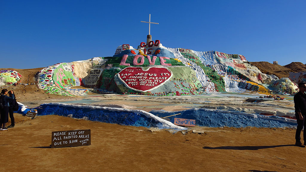 Our first stop was Salvation Mountain, a creation of Leonard Knight (1931–2014) in 1998. The mountain is built of adobe, desert trash (old tires, refrigerators, etc.), straw and thousands of gallons of paint.