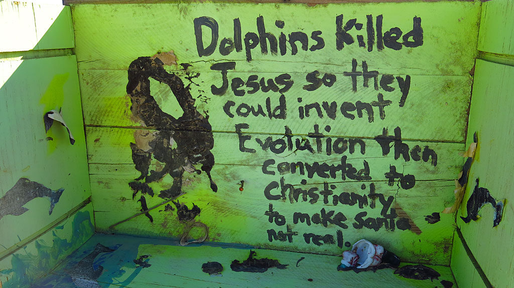 Philosophy at East Jesus: "Dolphins killed Jesus so they could invent Evolution then converted to Christianity to make Santa not real."