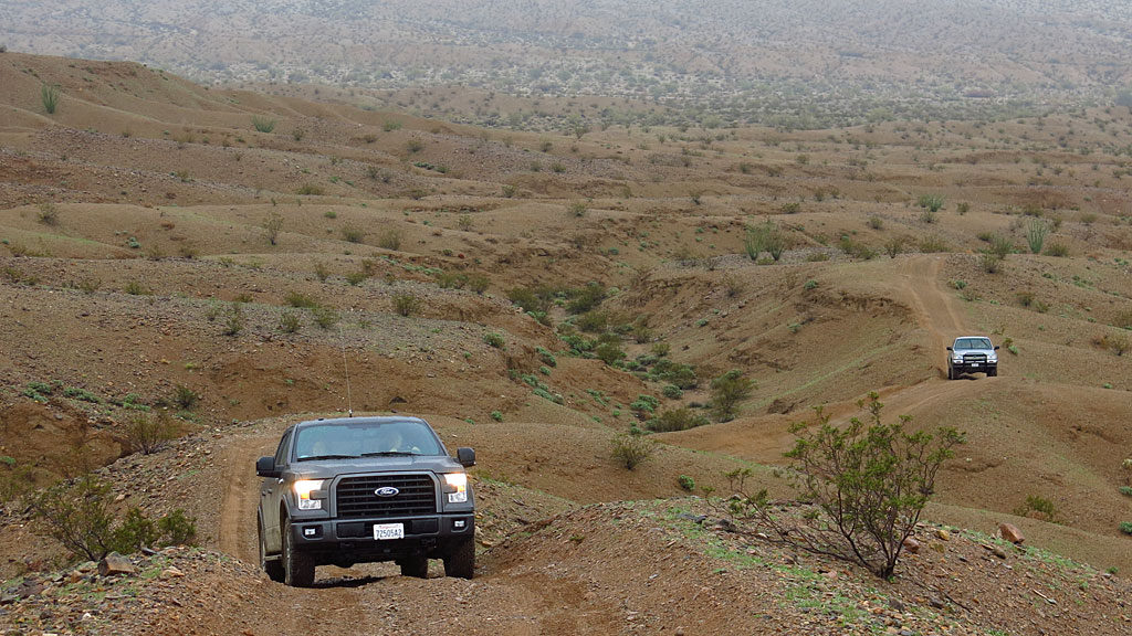Matt's new F-150 leads Henri and Robert up the jeep trail.