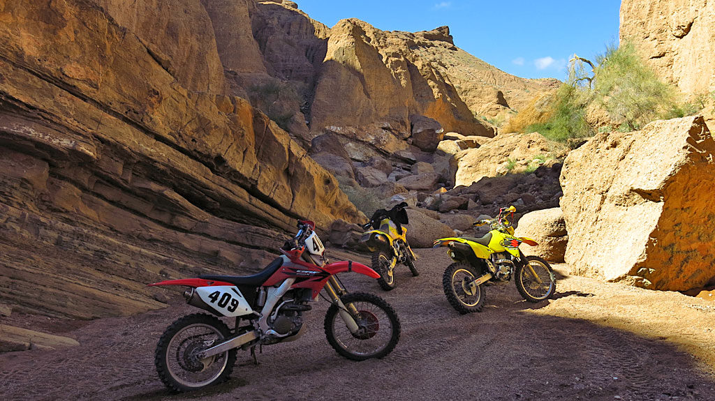 The new day's ride took us up a slot canyon named Red Canyon -- all fine until we ran into big boulders blocking the canyon. Later, we learned of alternative ways around the blockage.