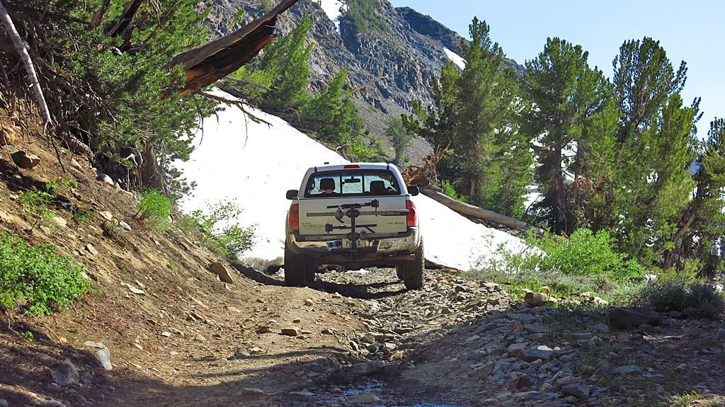 When it became time to reverse rudder, we realized that the last turn-out was a long way down the hill. With Dennis' help, I spun the truck around in the width of the road, backing up against a tree for added peace of mind.