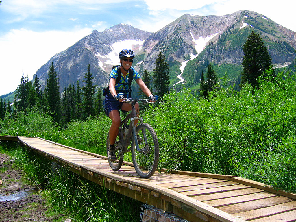 The traditional way to ride the 401 Trail is to ride up the graded dirt Gothic Road toward Scofield Pass, then take the 401 back down to town. But the top of the road was still snowed in, so if we wanted to ride the 401, we'd ride it up, then down. The traditional way to ride the 401 Trail is to ride up the graded dirt Gothic Road toward Scofield Pass, then take the 401 back down to town. But the top of the road was still snowed in, so if we wanted to ride the 401, we'd ride it up, then down.