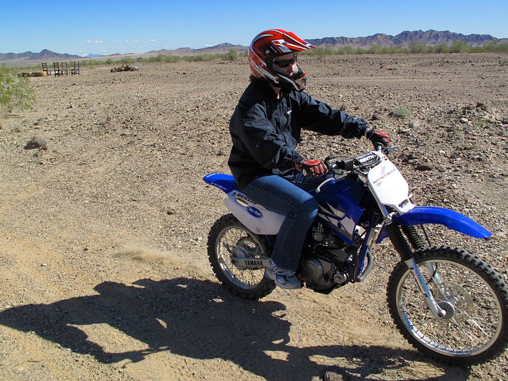 KT tears up the desert on her TTR. KT tears up the desert on her TTR.