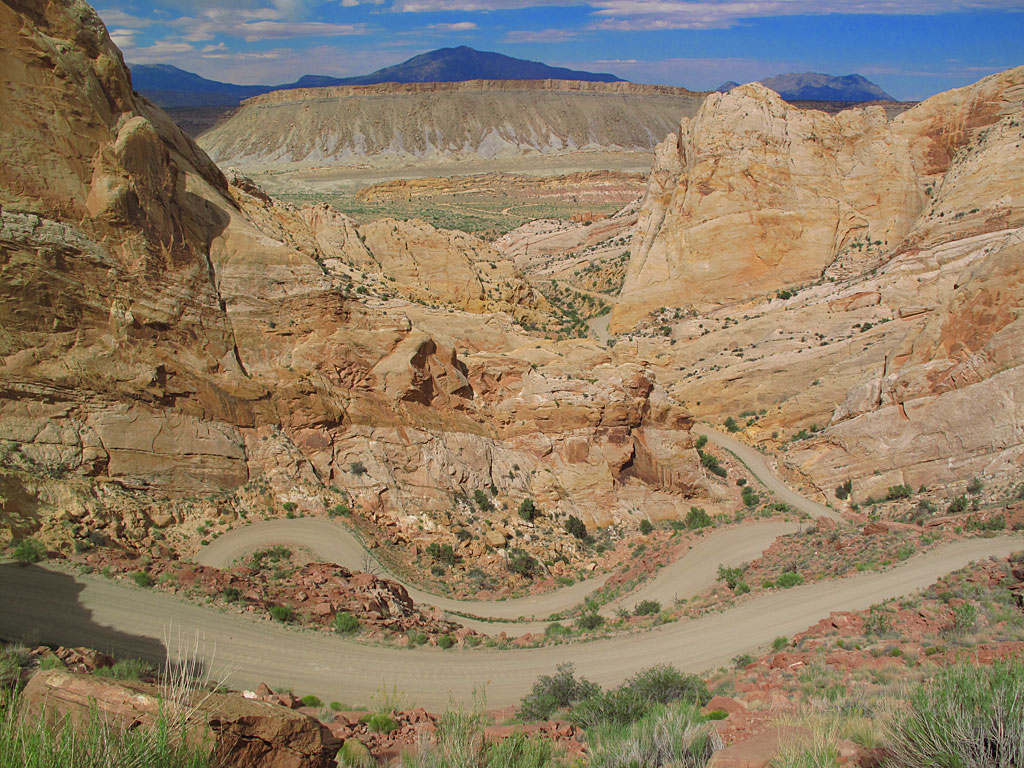 Burr Trail's switchbacks on the Capitol Reef National Park boundary. We got a distant view of the Waterpocket Fold, a 100-mile long bend in the earth's crust. Burr Trail's switchbacks on the Capitol Reef National Park boundary. We got a distant view of the Waterpocket Fold, a 100-mile long bend in the earth's crust.