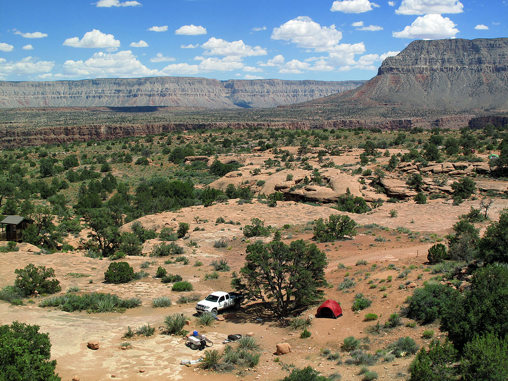 Our campsite. That rip in the earth, about 1/4 mile behind us, is the Grand Canyon. You really can't see it until you get to the edge. Our campsite. That rip in the earth, about 1/4 mile behind us, is the Grand Canyon. You really can't see it until you get to the edge.