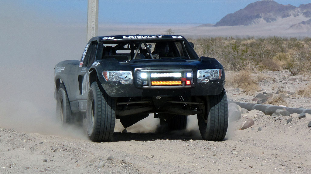 The COPS Trophy Truck rips along a pipeline near RM96.2. The COPS Trophy Truck rips along a pipeline near RM96.2.