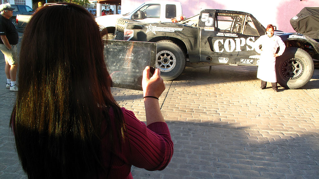After the race, Red Lobster personnel pose for photos next to the COPS Trophy Truck. After the race, Red Lobster personnel pose for photos next to the COPS Trophy Truck.