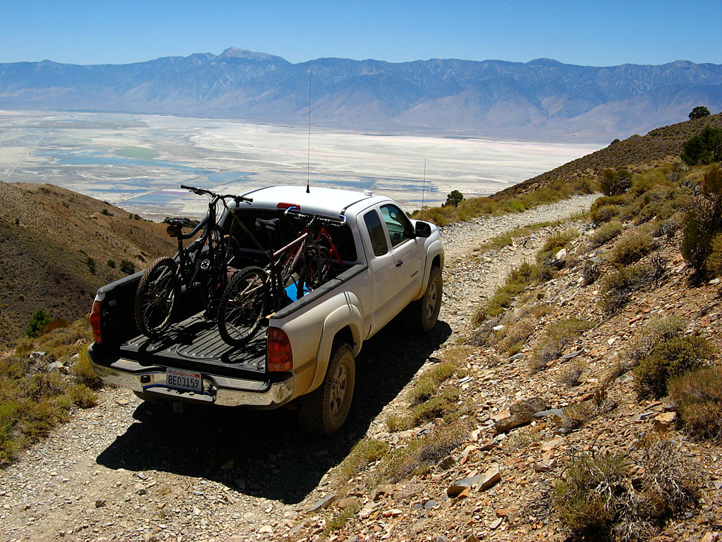 Leaving town, we decided to follow the Cerro Gordo-Keeler Road, which runs along the side of the Inyo Mountains with spectacular views of the Eastern Sierras and Owens Valley. We'd eventually bump into the Crossover Station for the Salt Tram, a turn-of-the-century tram which hauled salt from the Saline Valley, over the Inyo Mountains, and down to Owens lake (in the background). Once at Owens Lake, the salt was loaded onto ships and taken across to the railhead on the west side for shipment. Leaving town, we decided to follow the Cerro Gordo-Keeler Road, which runs along the side of the Inyo Mountains with spectacular views of the Eastern Sierras and Owens Valley. We'd eventually bump into the Crossover Station for the Salt Tram, a turn-of-the-century tram which hauled salt from the Saline Valley, over the Inyo Mountains, and down to Owens lake (in the background). Once at Owens Lake, the salt was loaded onto ships and taken across to the railhead on the west side for shipment.