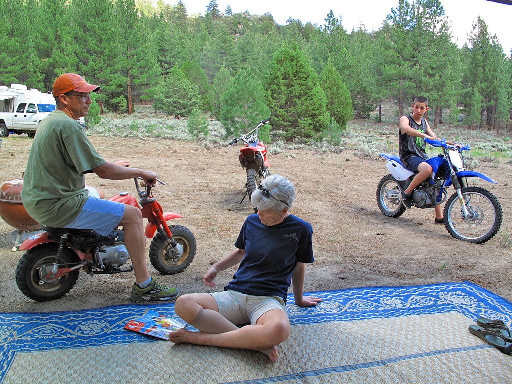 Tito, Carol and Matthew, each in their own way, relaxing at camp.