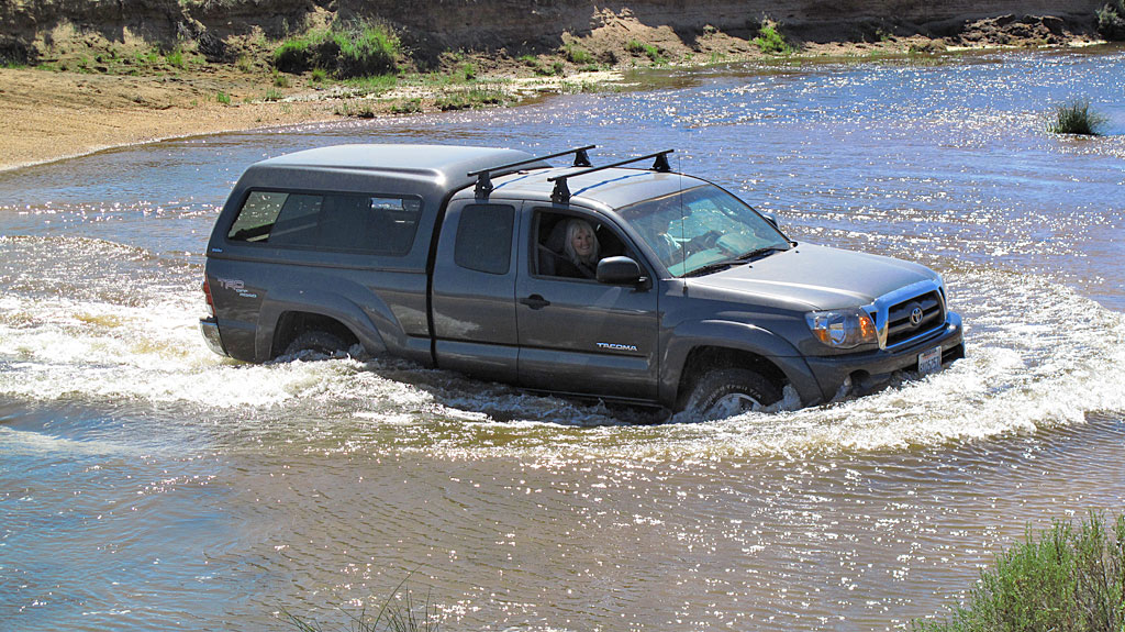 Dave and Irene drive their new Tacoma across the South Fork of the Kern River in Monache Meadows. Dave and Irene drive their new Tacoma across the South Fork of the Kern River in Monache Meadows.