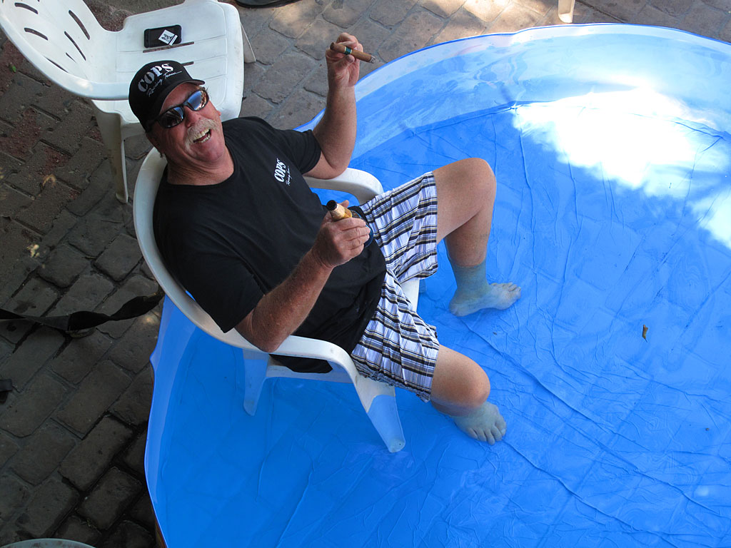 Ron manages to stay cool in a kiddie pool the team purchased - the hotel where we were staying didn't have its own pool. A beer helps too. Ron manages to stay cool in a kiddie pool the team purchased - the hotel where we were staying didn't have its own pool. A beer helps too.