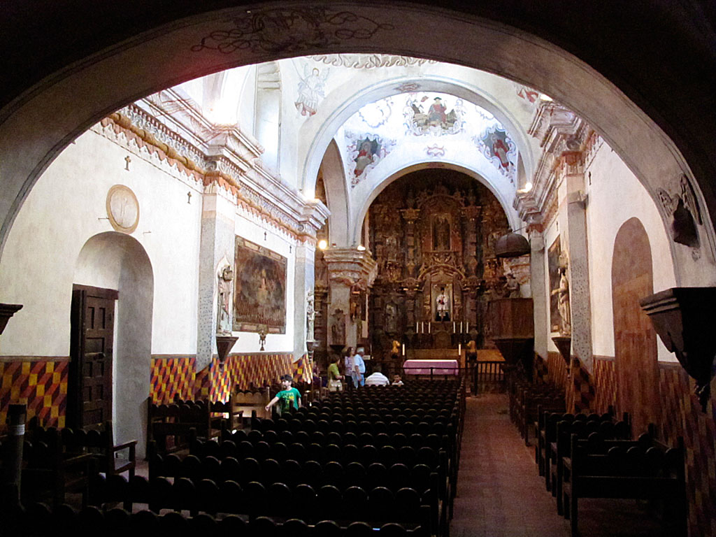 Inside the Mission, looking toward the alter. The Mission is still used for church services. Inside the Mission, looking toward the alter. The Mission is still used for church services.