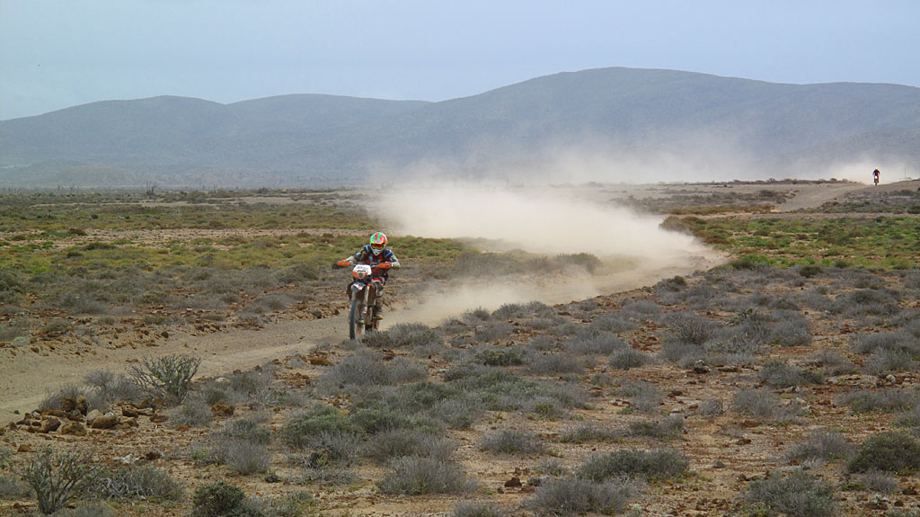 Two-wheeled racers passing us near RM435. Two-wheeled racers passing us near RM435.