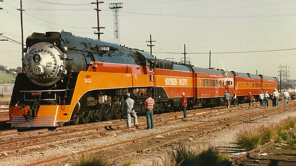 The film crew was lighting up the train for an interior shot in the first passenger car.