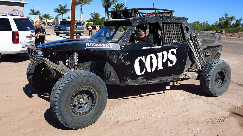 The COPS prerunner was built by Racer Engineering, sporting a race Corvette motor and three feet of suspension travel. It has two front seats and one back seat - perfect for optimum course reconnaissance.