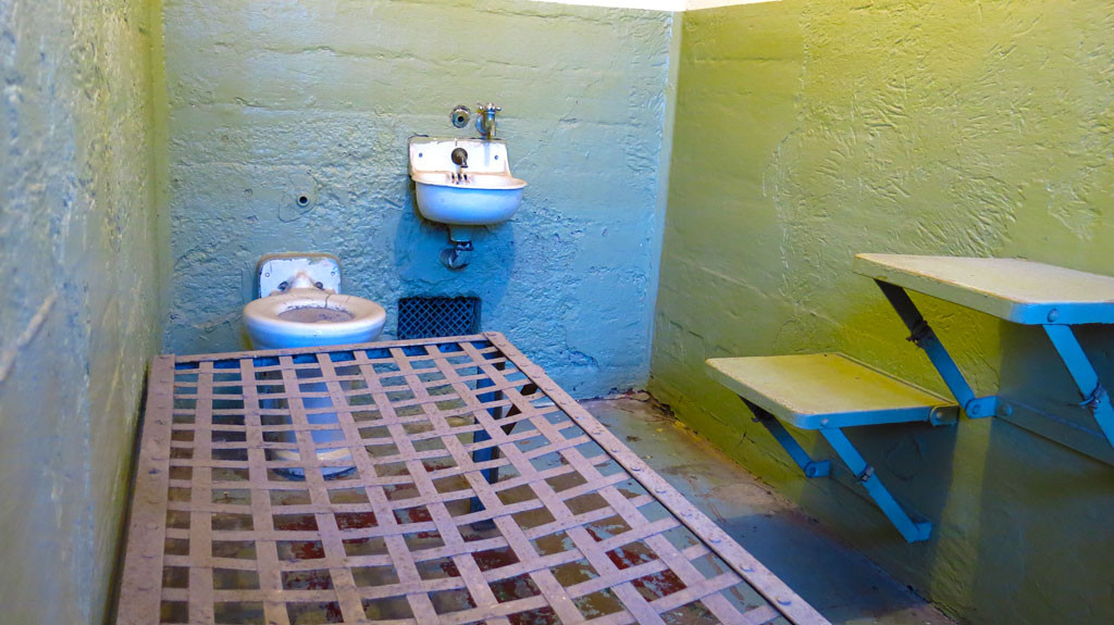 Living conditions were not plush at the prison. Cells came with a bed, sink, toilet, seat and table. Ceilings were 7' tall.