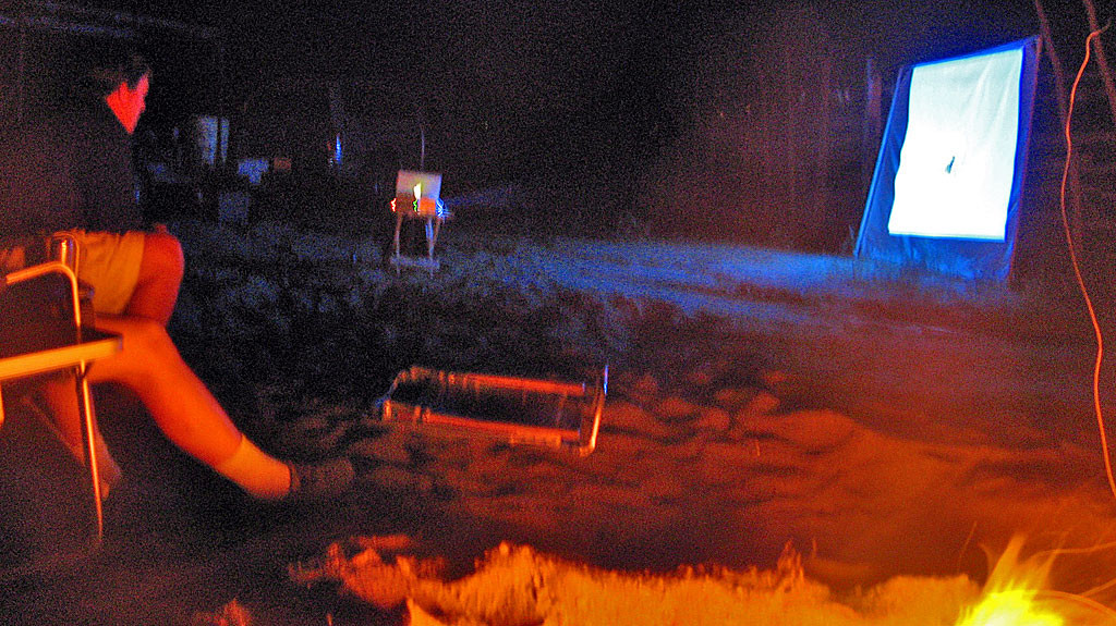 OK, one of the coolest things we've ever done. We took a projector and laptop and watched Dust To Glory on the big screen at Coco's Corner with Coco, who appeared the movie. He was a gracious host providing chairs and beers for everyone watching the movie. About 20 other race people joined us watching the movie. As soon as Coco's part was over, he stood up and announced, "my part is over, I'm going to bed."