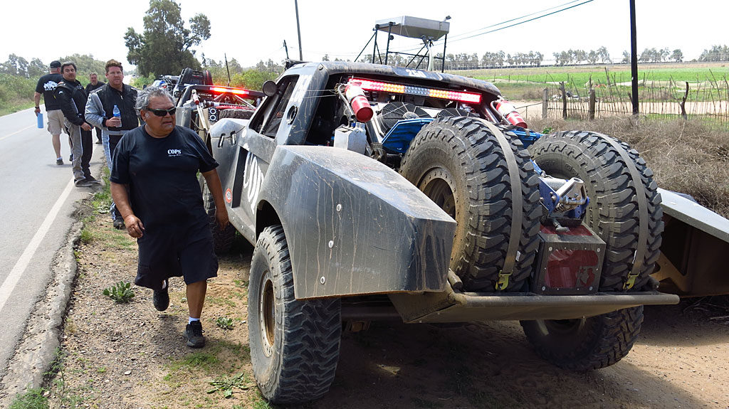 The second truck arrives in our pits - George prepares to fuel it.