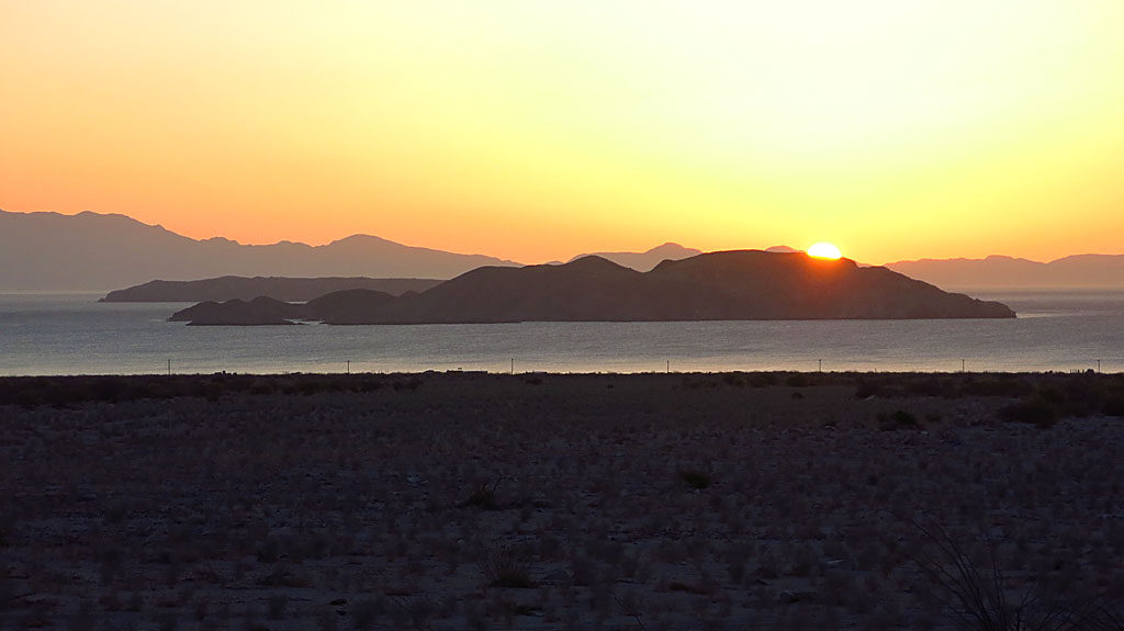 Sunup at the Bay of LA. The first cars depart town at 7:30.