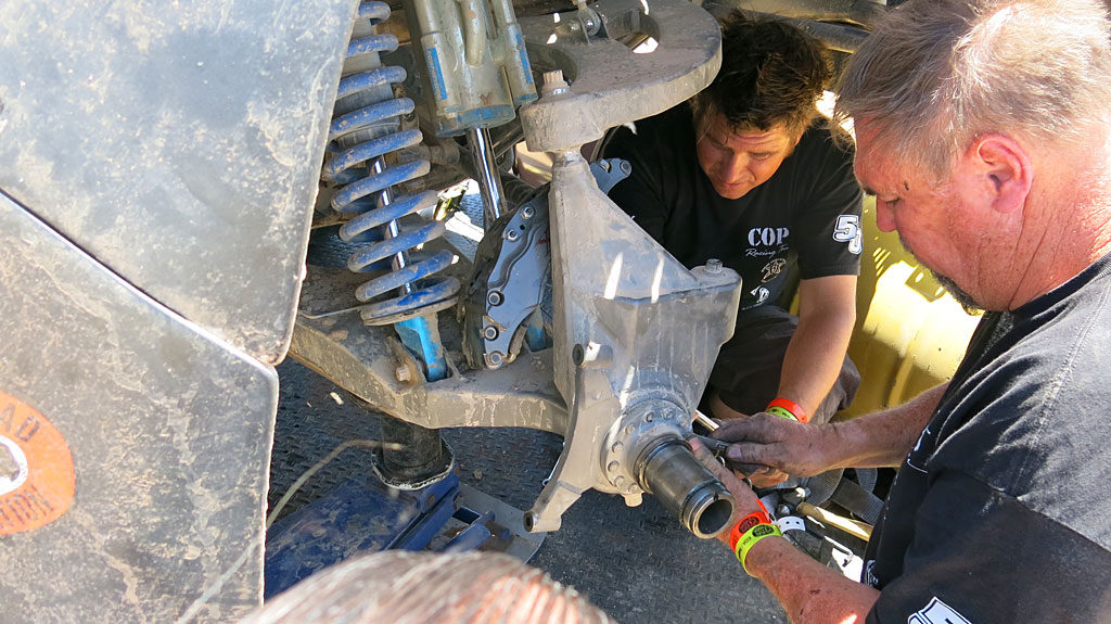 Dennis and Corey and Mike swap out the #250's wheel bearing with the broken #29's bearing.