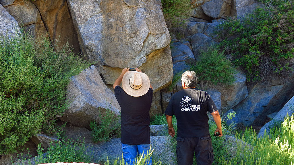 Bob snaps photos of old graffiti at Camp Rock Spring: "Stua, 4th Inf. May 16" - this was most likely written in either 1867 or 1868 by Charles Stuart, a musician in Company B, 4th Infantry, California Volunteers. The camp was established in 1866 and in 1868 US Mail was taken off the Mojave Road and the presence of the Army was no longer required.