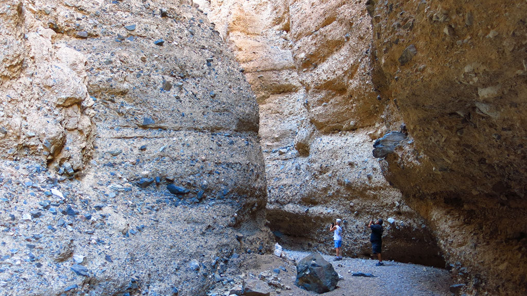 Carol and George in a slot canyon which branches off Afton Canyon. Heading upstream, the canyon roof closes in which transforms the hiking experience into more of a spelunking experience. If you plan on walking here, bring a flashlight.