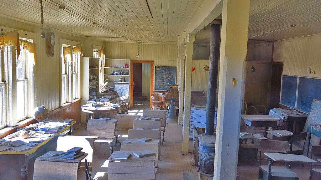 A ground floor school room in the two-story school house.