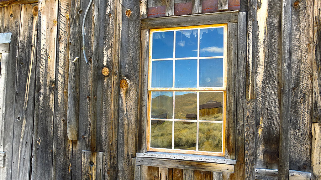 Weathered wood with artsy-farty reflectorizing.