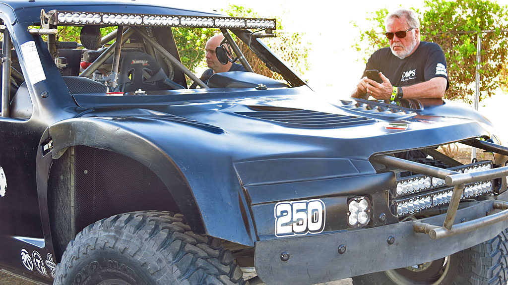 Early morning, John and Mike are going over their truck. John was noticeably antsy -- he was anxious to get to the starting line.