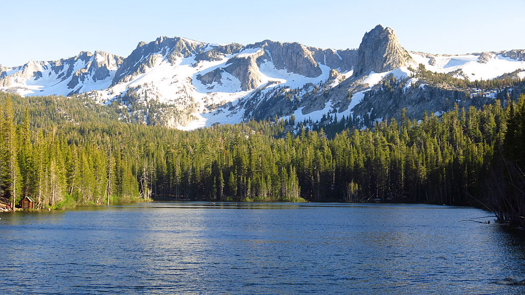 600 inches of winter snow in the Sierras translates to a ton of snow remaining in July. Creeks are flowing fast and full, and lakes crept into the forests.