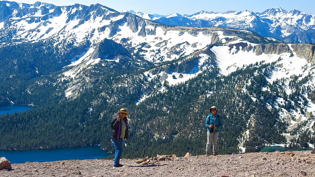 Jan and Carol look at distant lakes from the top of Mammoth Mountain.